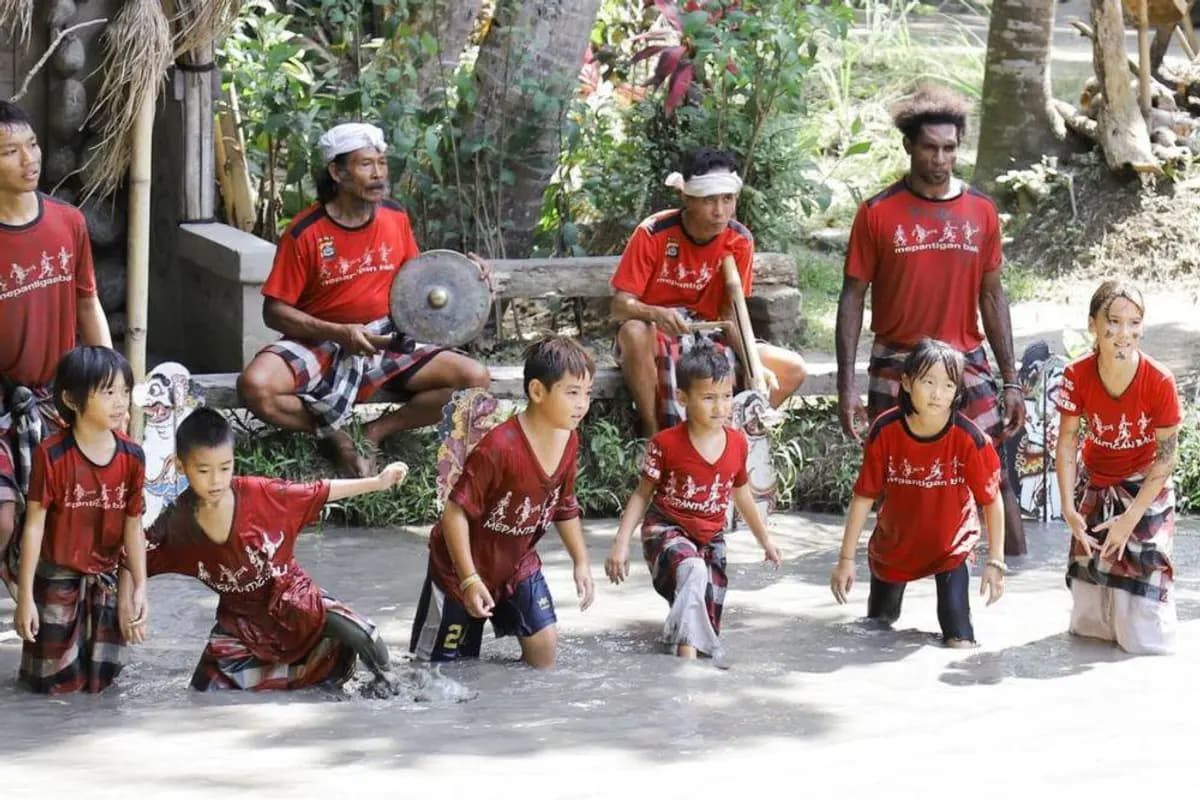what to do in bali kids play in mud